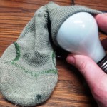 Inserting Light Bulb into Smartwool Sock